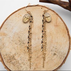 Cross medallion dangle earrings